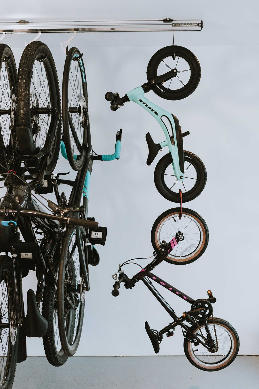 diagram of bikes being hung, store more bikes in less space
