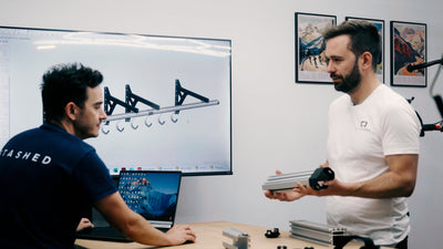 Elliot and Pete looking at CAD drawings on a screen