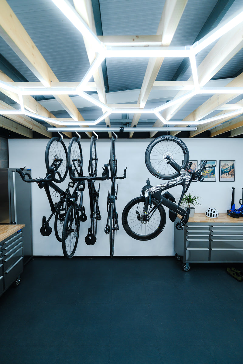Ceiling mount SpaceRail bike storage