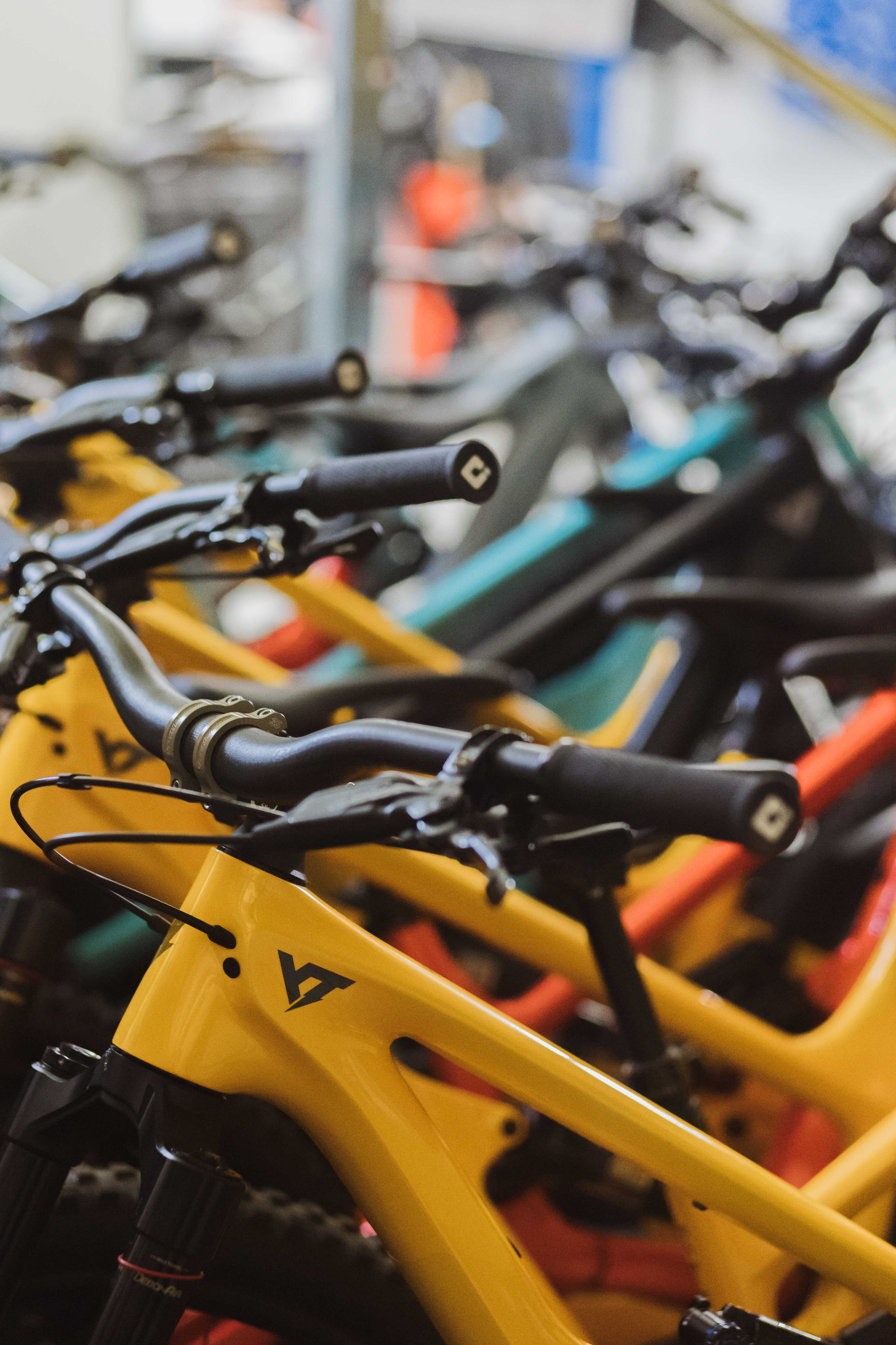 YT bikes stored in a traditional storage system