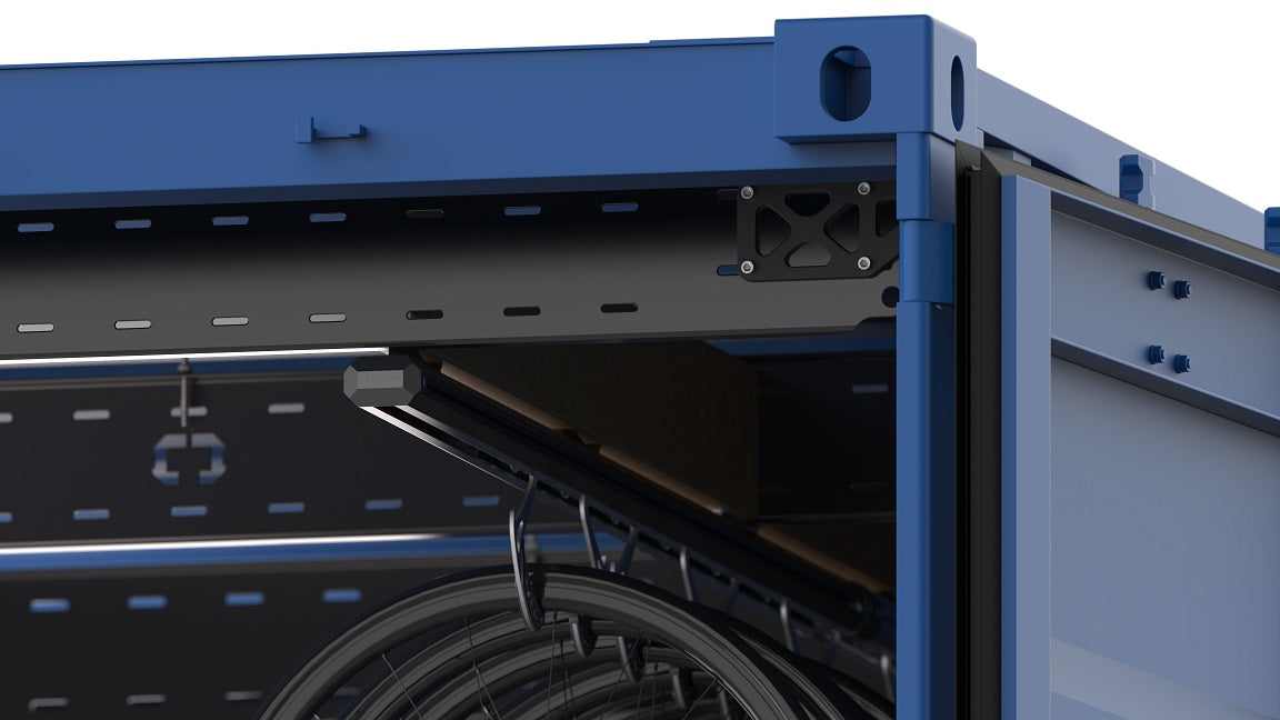 close up on bike storage systems built into shipping container