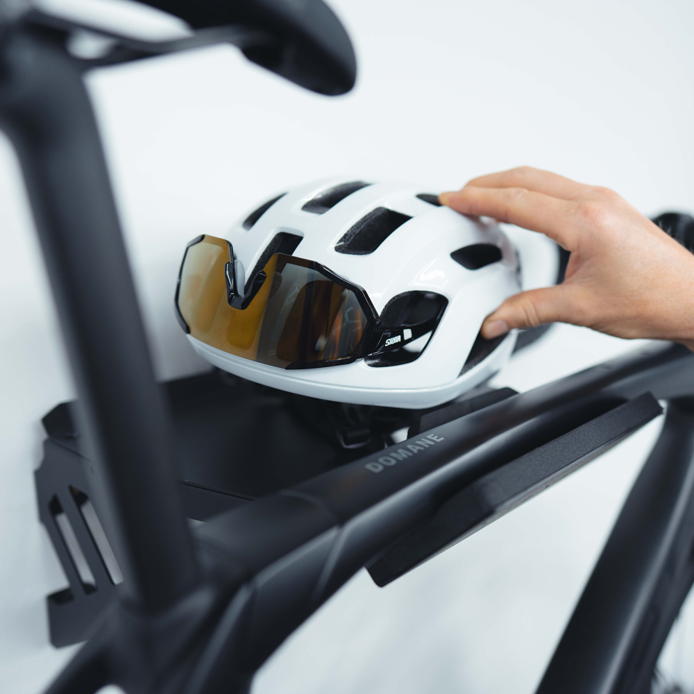 Road bike stored on the SpaceRail ONE wall mounted bike rack