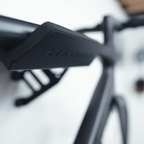 SpaceRail ONE bike wall mount fitted to a wall with a road bike in place