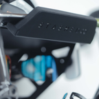 Bike wall mount with helmet, shoe and sunglasses hooks beneath the shelf