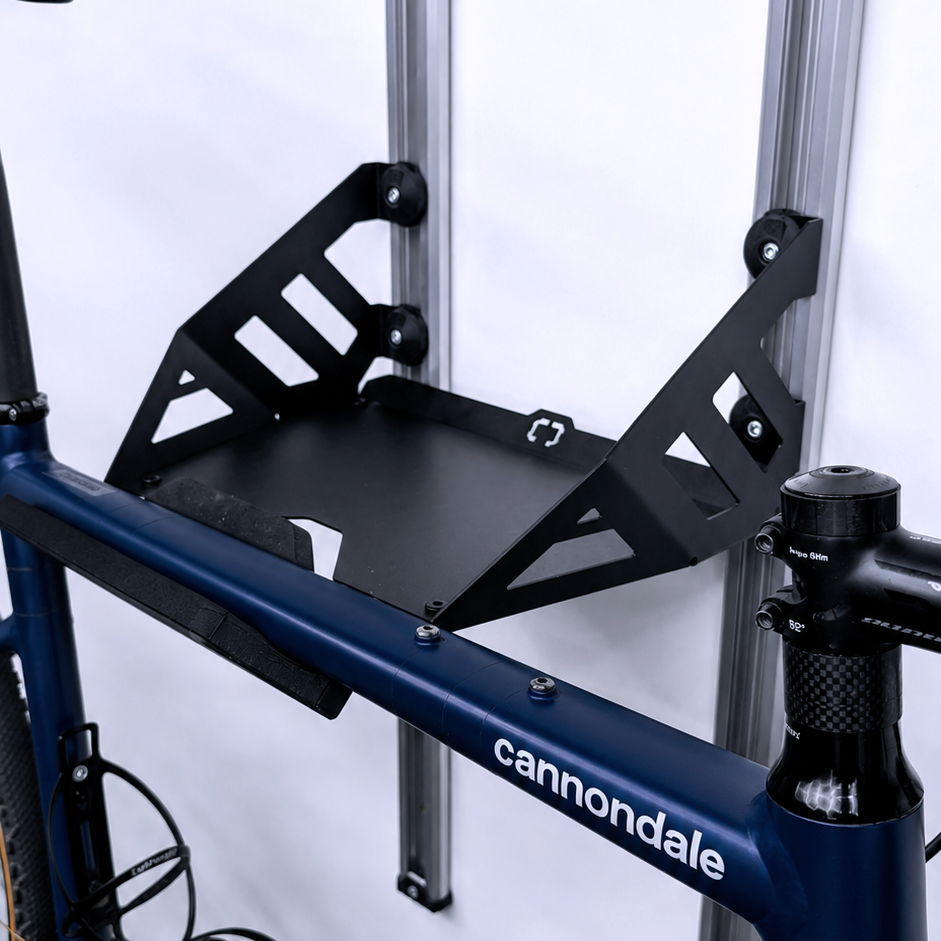 Road bike held by the frame on the rail mounted SpaceRail ONE Starter Set