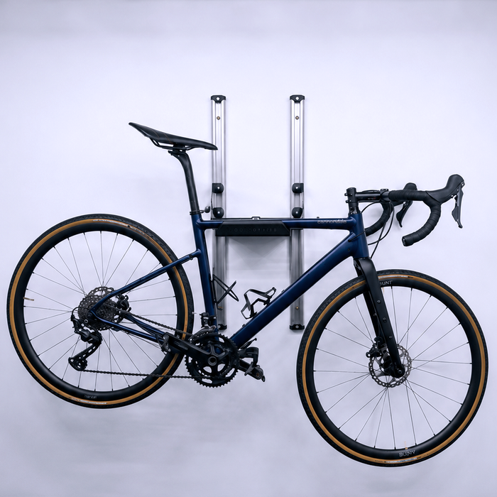 SpaceRail ONE Rail Mounted Starter Set holding a bike
